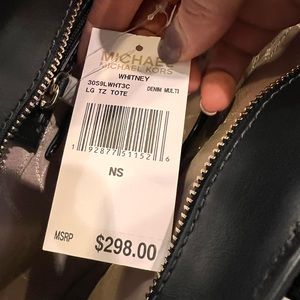 Brand new Michael Kors shoulder bag. Large enough for lap top.